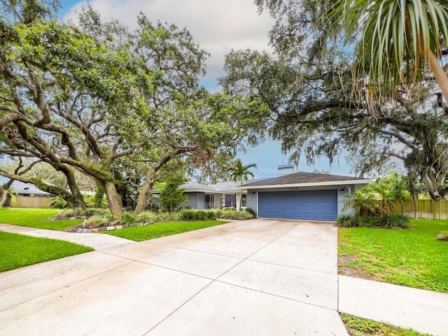3005 Wilton Ln, Valrico, FL 33596 - single story home with a garage, concrete driveway, and stucco siding