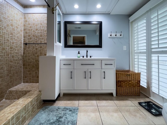 3005 Wilton Ln, Valrico, FL 33596 - bathroom with vanity, a tile shower, tile patterned flooring, and recessed lighting