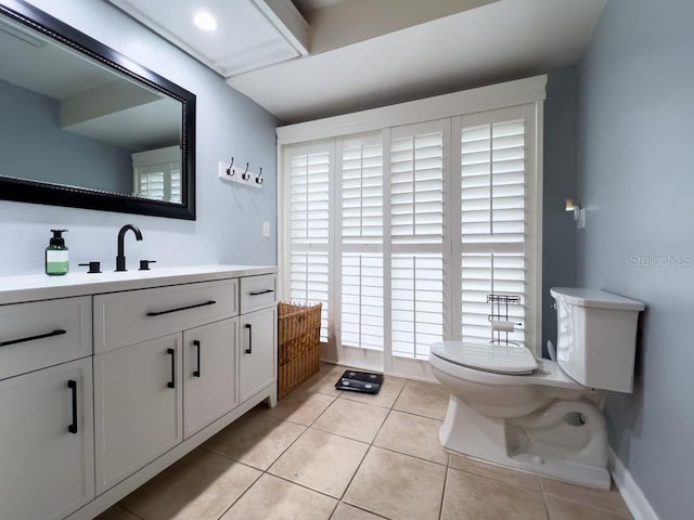 3005 Wilton Ln, Valrico, FL 33596 - bathroom featuring toilet, vanity, and tile patterned flooring