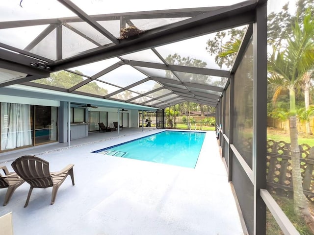 3005 Wilton Ln, Valrico, FL 33596 - outdoor pool with a patio area, a ceiling fan, and a lanai