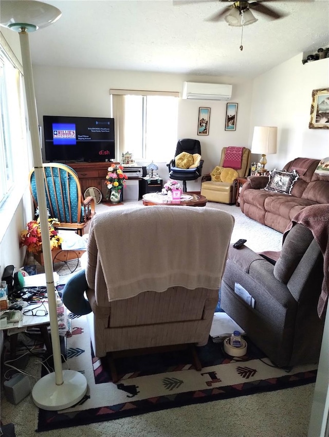 39343/39349 Rusbe, Zephyrhills, FL 33540 - living room with carpet floors, a wall mounted AC, and a ceiling fan