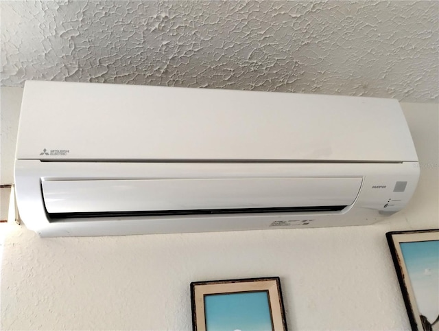 39343/39349 Rusbe, Zephyrhills, FL 33540 - detailed view of a wall mounted AC and a textured ceiling
