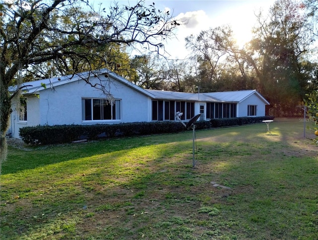 39343/39349 Rusbe, Zephyrhills, FL 33540 - ranch-style house featuring stucco siding and a front yard
