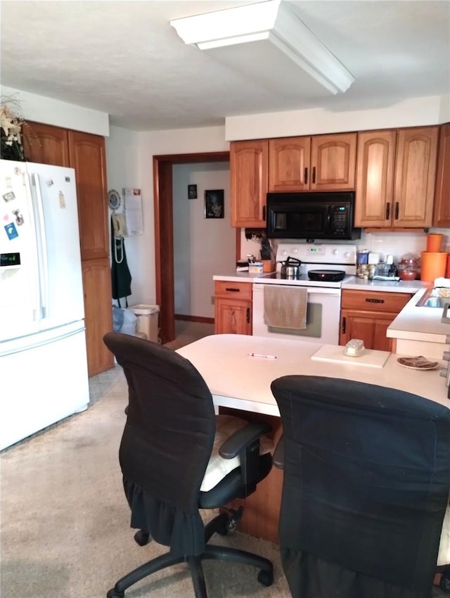 39343/39349 Rusbe, Zephyrhills, FL 33540 - kitchen with white appliances, brown cabinets, and light countertops