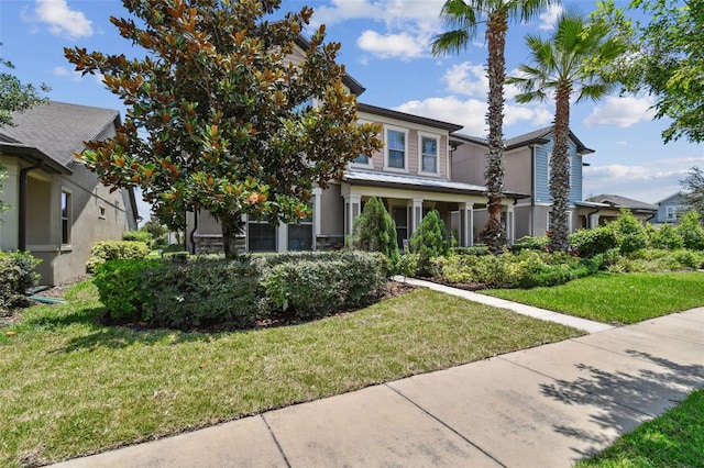14110 Barrington Stowers Dr, Lithia, FL 33547 - view of front of property featuring stucco siding and a front yard