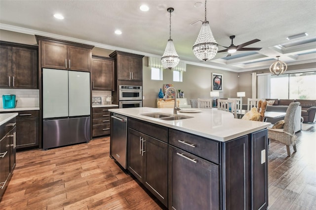 14110 Barrington Stowers Dr, Lithia, FL 33547 - kitchen featuring stainless steel appliances, a chandelier, crown molding, a sink, and ceiling fan