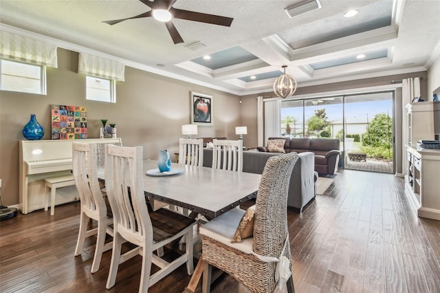 14110 Barrington Stowers Dr, Lithia, FL 33547 - dining room with crown molding, a ceiling fan, dark wood-type flooring, a chandelier, and beam ceiling