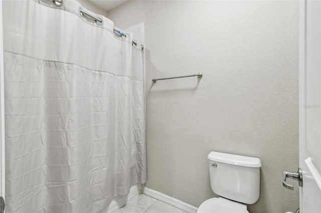 14110 Barrington Stowers Dr, Lithia, FL 33547 - bathroom with toilet, marble finish flooring, and a shower with shower curtain