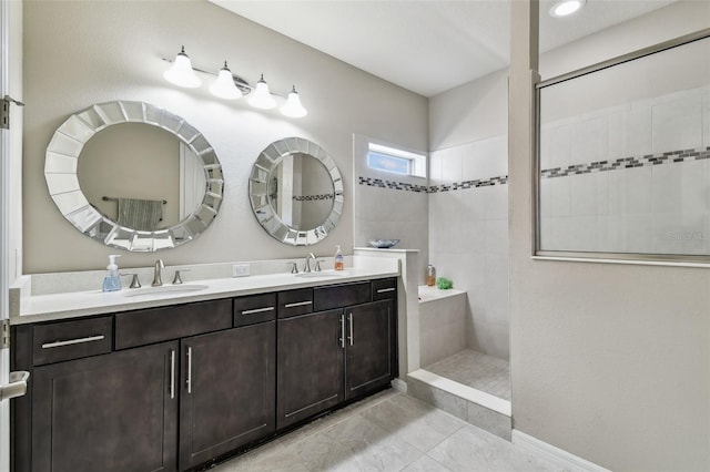 14110 Barrington Stowers Dr, Lithia, FL 33547 - full bath featuring double vanity, a walk in shower, and tile patterned flooring