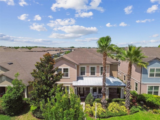 14110 Barrington Stowers Dr, Lithia, FL 33547 - rear view of property featuring covered porch