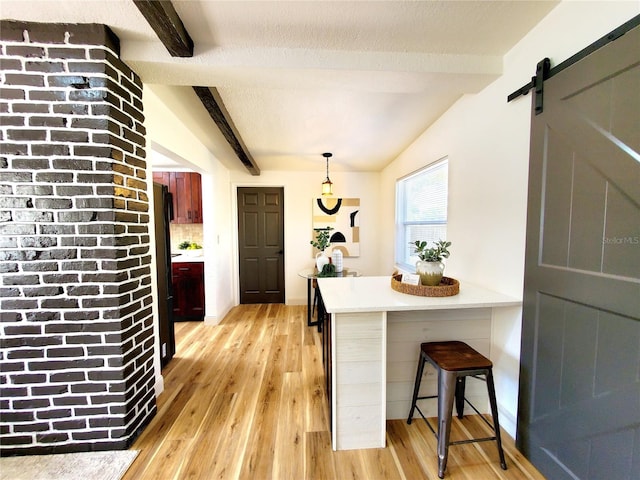 1373 Fairfax Rd, Clearwater, FL 33764 - entrance foyer featuring light wood-style flooring and a barn door