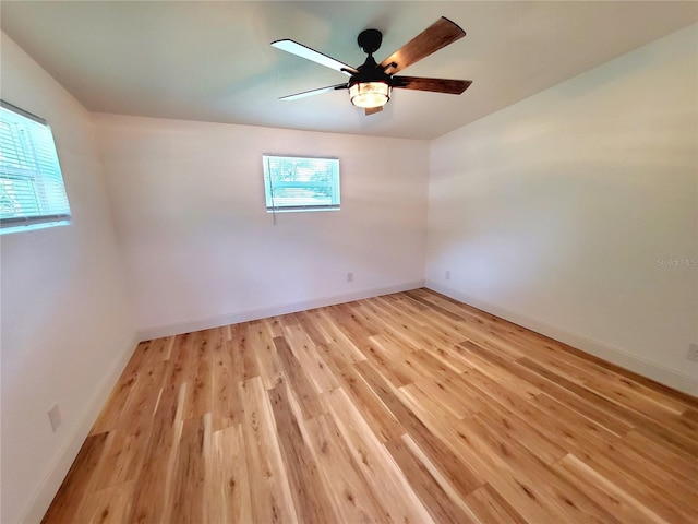 1373 Fairfax Rd, Clearwater, FL 33764 - spare room featuring light wood-style floors and a ceiling fan