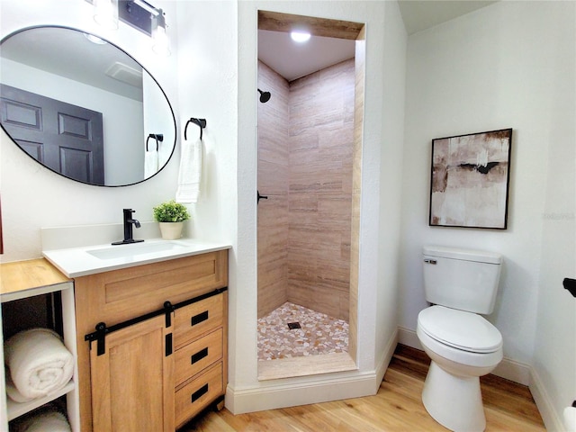 1373 Fairfax Rd, Clearwater, FL 33764 - full bath with vanity, a stall shower, and wood finished floors