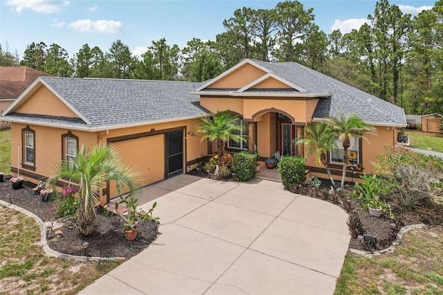 14494 Copeland Way, Brooksville, FL 34604 - single story home featuring stucco siding, concrete driveway, a garage, and a shingled roof