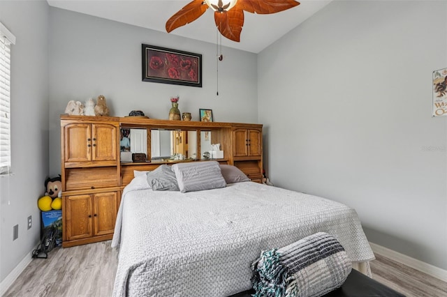 14494 Copeland Way, Brooksville, FL 34604 - bedroom with light wood-style flooring, baseboards, and ceiling fan