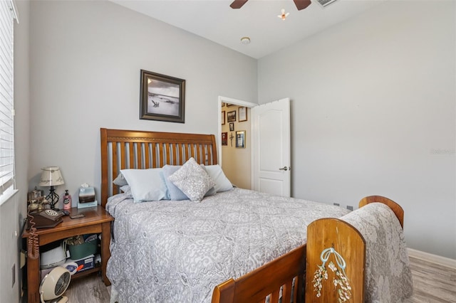 14494 Copeland Way, Brooksville, FL 34604 - bedroom featuring wood finished floors, baseboards, and ceiling fan