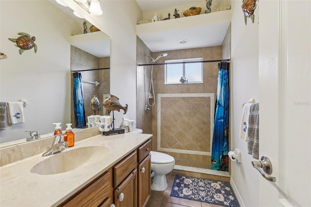 14494 Copeland Way, Brooksville, FL 34604 - bathroom featuring vanity, toilet, tiled shower, and tile patterned flooring