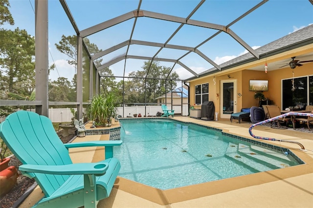 14494 Copeland Way, Brooksville, FL 34604 - view of swimming pool with a patio area, a ceiling fan, and glass enclosure