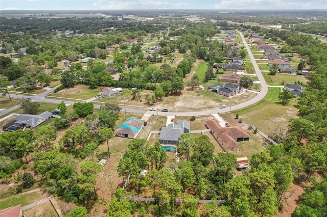 14494 Copeland Way, Brooksville, FL 34604 - aerial view of property and surrounding area with nearby suburban area