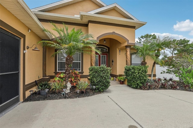 14494 Copeland Way, Brooksville, FL 34604 - view of exterior entry with stucco siding