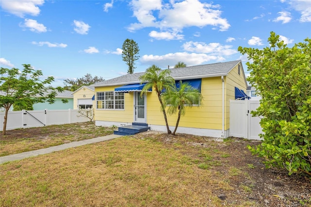260 42nd Ave, St Pete Beach, FL 33706 - view of front of house featuring a gate