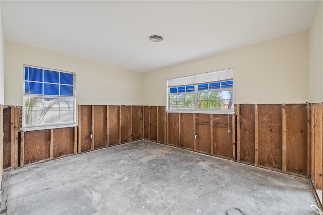 260 42nd Ave, St Pete Beach, FL 33706 - empty room with wainscoting and wooden walls