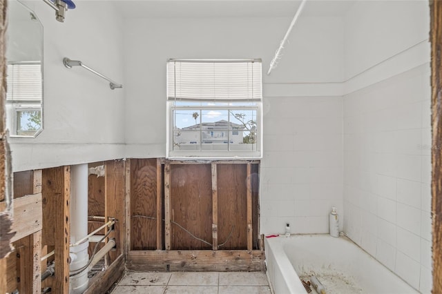 260 42nd Ave, St Pete Beach, FL 33706 - bathroom featuring a bath and tile patterned flooring