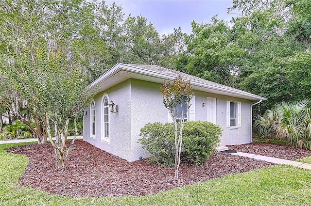 27511 Hialeah Way, Wesley Chapel, FL 33544 - view of home's exterior with stucco siding