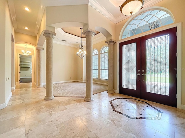 27511 Hialeah Way, Wesley Chapel, FL 33544 - entryway featuring ornate columns, arched walkways, french doors, ornamental molding, and recessed lighting