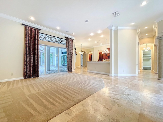 27511 Hialeah Way, Wesley Chapel, FL 33544 - unfurnished living room with a chandelier, crown molding, baseboards, decorative columns, and arched walkways