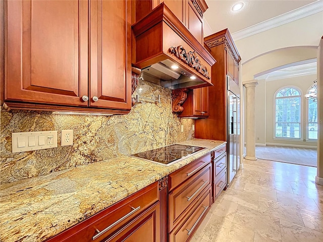 27511 Hialeah Way, Wesley Chapel, FL 33544 - kitchen featuring decorative columns, crown molding, arched walkways, high end fridge, and black electric cooktop