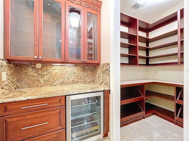 27511 Hialeah Way, Wesley Chapel, FL 33544 - indoor dry bar with beverage cooler and tasteful backsplash