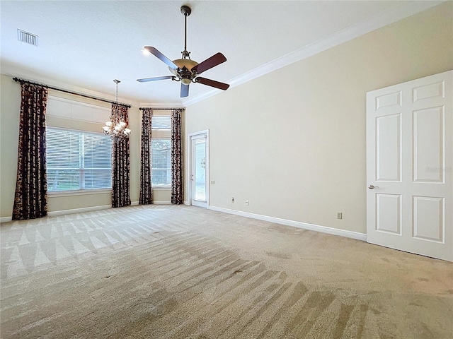 27511 Hialeah Way, Wesley Chapel, FL 33544 - spare room with a chandelier, crown molding, light colored carpet, ceiling fan, and baseboards