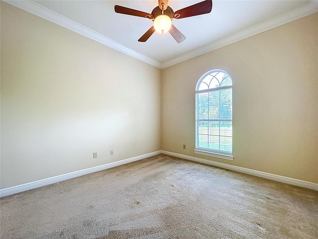 27511 Hialeah Way, Wesley Chapel, FL 33544 - spare room with light carpet, baseboards, ornamental molding, and a ceiling fan