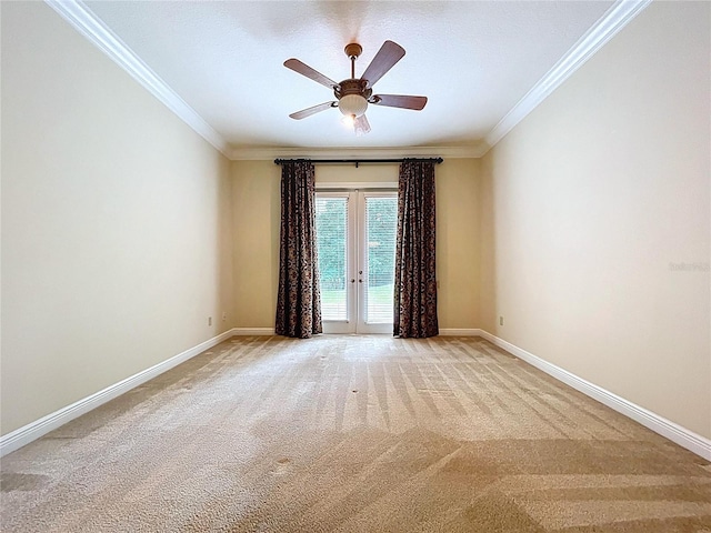 27511 Hialeah Way, Wesley Chapel, FL 33544 - spare room featuring french doors, ornamental molding, light carpet, baseboards, and ceiling fan