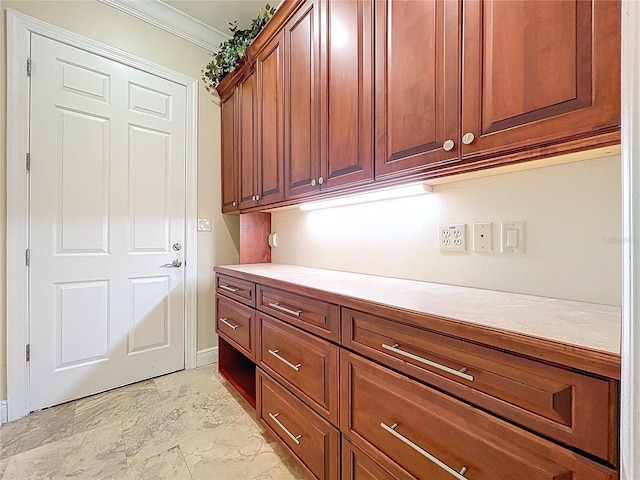 27511 Hialeah Way, Wesley Chapel, FL 33544 - laundry area featuring ornamental molding and baseboards