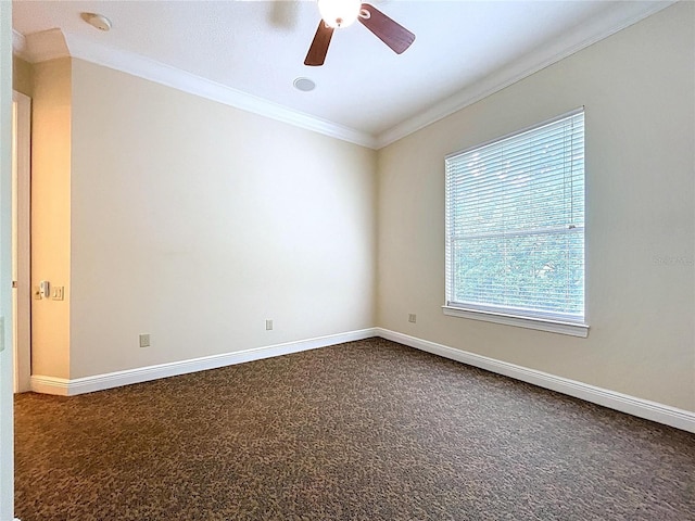 27511 Hialeah Way, Wesley Chapel, FL 33544 - empty room featuring ornamental molding, dark carpet, ceiling fan, a smoke detector, and baseboards
