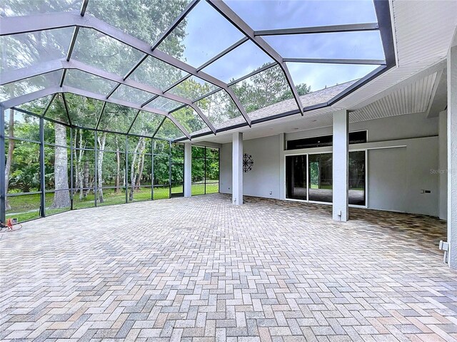 27511 Hialeah Way, Wesley Chapel, FL 33544 - view of patio with glass enclosure