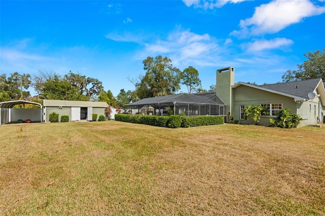6143 Black Walnut Dr, Bartow, FL 33830 - view of grassy yard featuring a carport