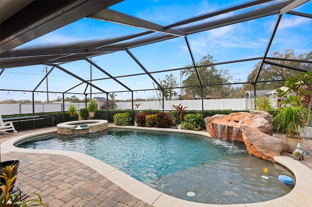 6143 Black Walnut Dr, Bartow, FL 33830 - view of swimming pool featuring a pool with connected hot tub, a fenced backyard, a lanai, and a patio