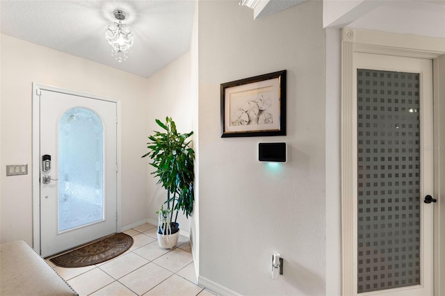 6143 Black Walnut Dr, Bartow, FL 33830 - entrance foyer with baseboards and light tile patterned flooring