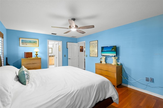 6143 Black Walnut Dr, Bartow, FL 33830 - bedroom with wood finished floors, baseboards, and ceiling fan
