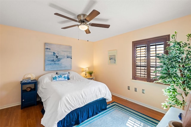 6143 Black Walnut Dr, Bartow, FL 33830 - bedroom with wood finished floors, baseboards, and ceiling fan