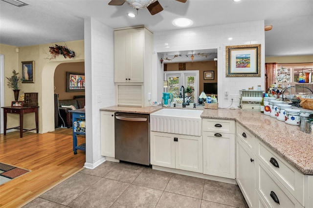 1151 Lancer Ln, Tarpon Springs, FL 34689 - kitchen featuring stainless steel dishwasher, a sink, ceiling fan, healthy amount of natural light, and recessed lighting