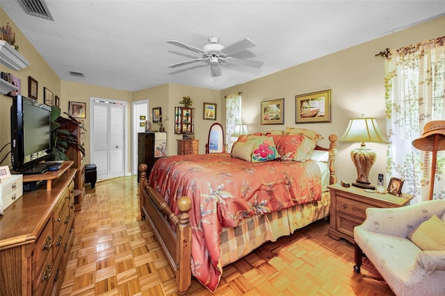 1151 Lancer Ln, Tarpon Springs, FL 34689 - bedroom with multiple windows, a ceiling fan, and a closet