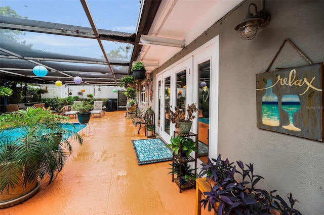 1151 Lancer Ln, Tarpon Springs, FL 34689 - view of patio with french doors and a lanai