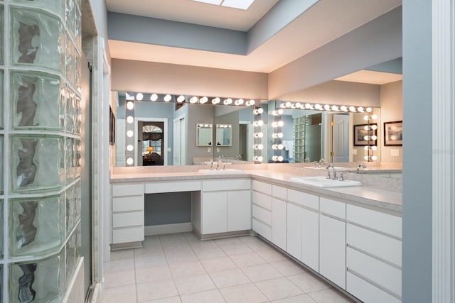 3452 Forelock Rd, Tarpon Springs, FL 34688 - bathroom with double vanity and tile patterned flooring