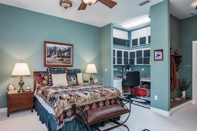 3452 Forelock Rd, Tarpon Springs, FL 34688 - carpeted bedroom with an office area and ceiling fan