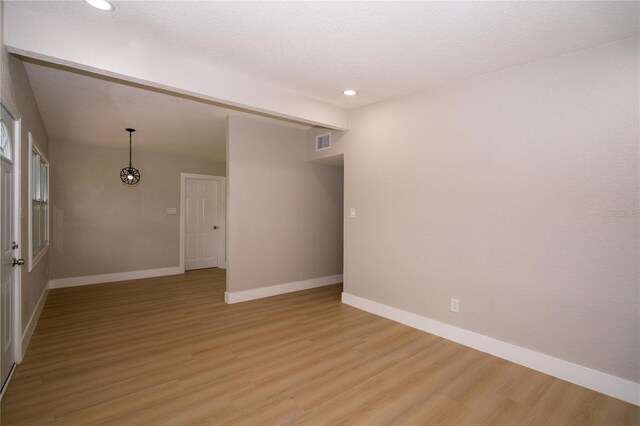 8502 Grapefruit Ave, Tampa, FL 33619 - empty room featuring recessed lighting and light wood finished floors