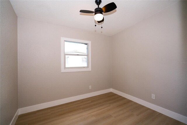 8502 Grapefruit Ave, Tampa, FL 33619 - spare room featuring light wood-type flooring and baseboards